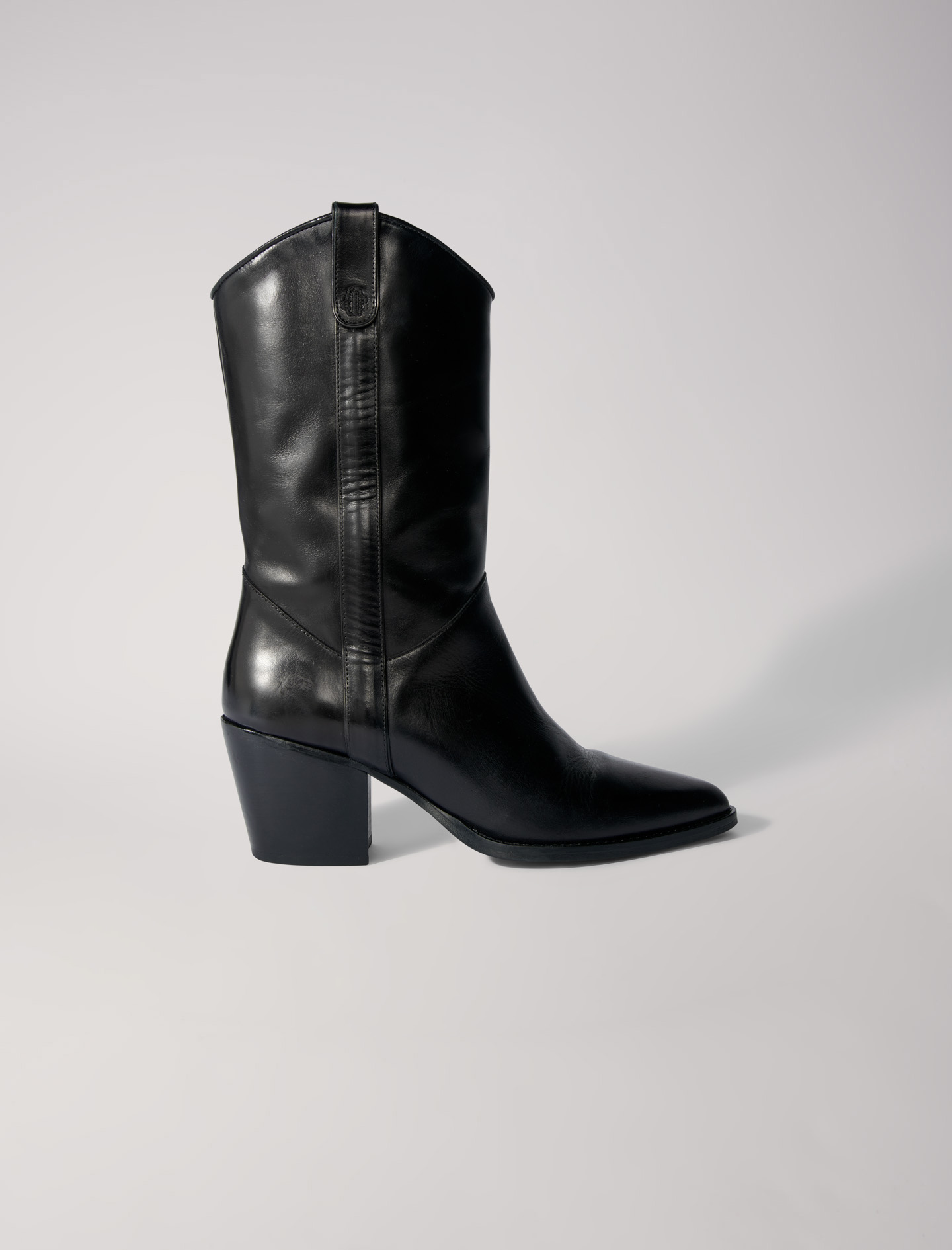 Heeled leather boots